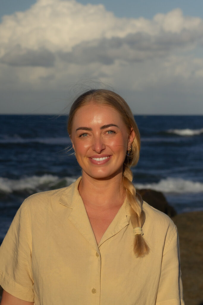 Currumbin chiropractor Dr Courtney Cox at Cura Chiropractic providing holistic, evidence-based care including red light therapy, dry needling, and sports injury support on the Gold Coast.